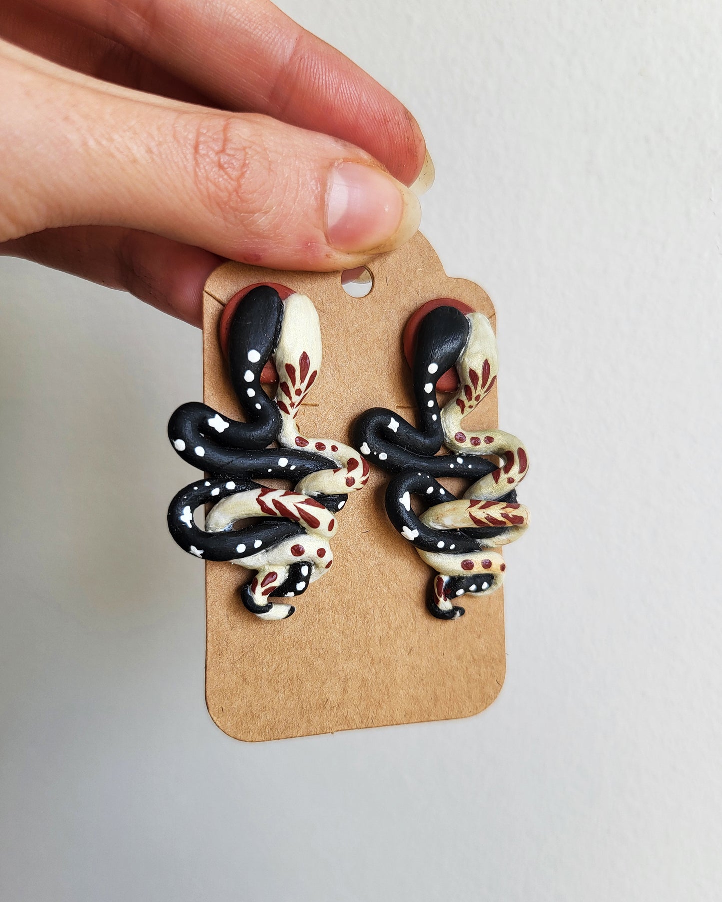 Large Black and White Ritual Snakes Earrings